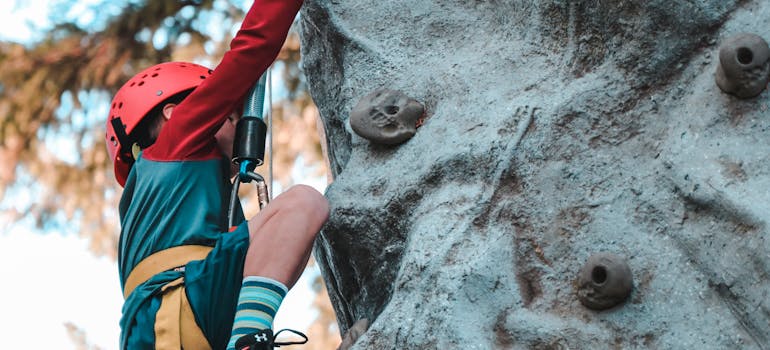 A person climbing a rock