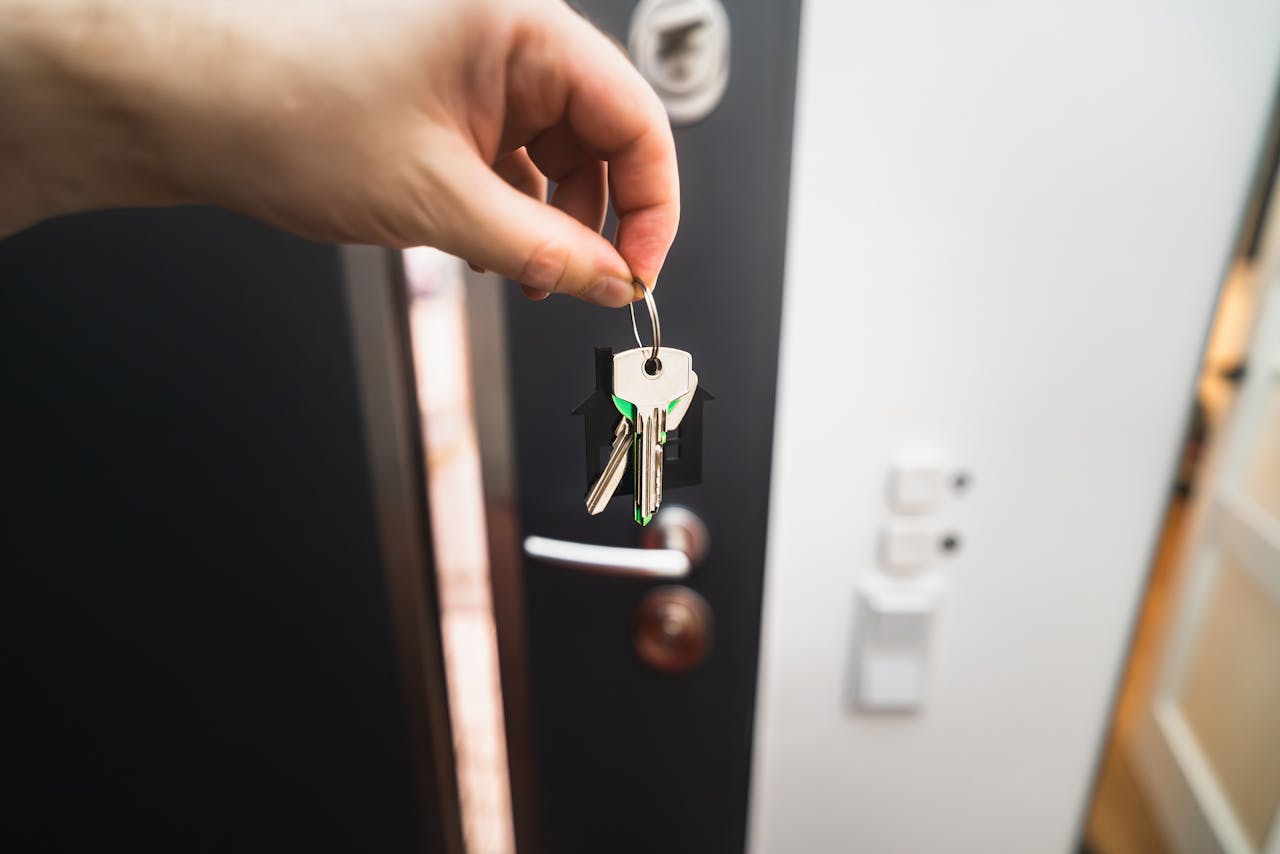 A person holding keys