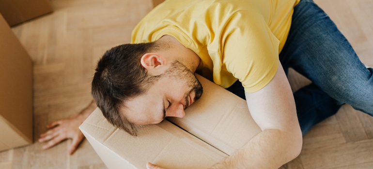 a boy lying on the box